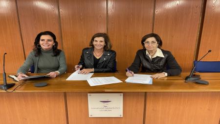 Firma del acuerdo entre AECC Girona y COF Girona. 